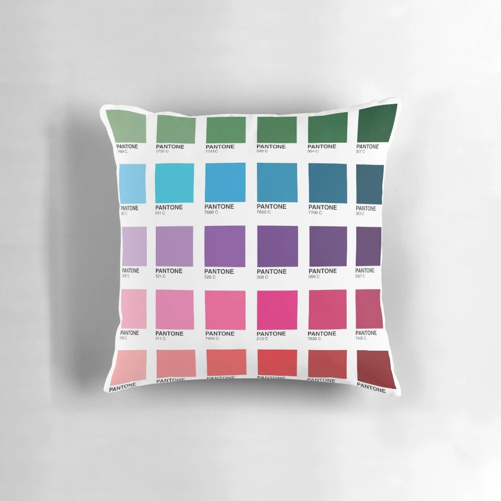 Colorful throw pillow featuring different shades of Pantone colors, perfect for graphic designers and home decor enthusiasts.