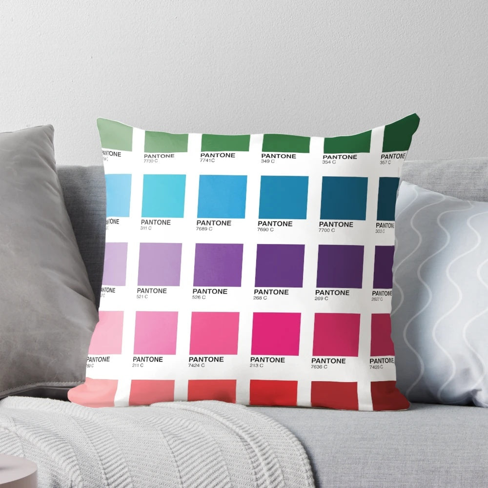 Colorful throw pillow featuring different shades of Pantone colors, perfect for graphic designers and home decor enthusiasts.