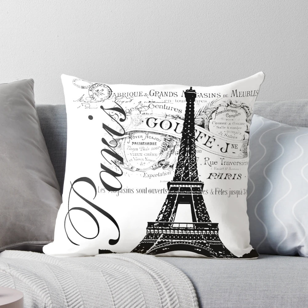 Vintage-style Eiffel Tower pillow with a distressed, Parisian-inspired design in black and white.