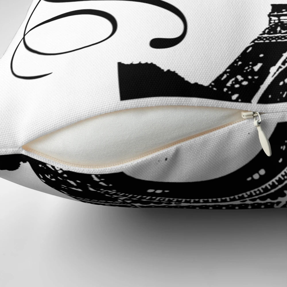 Vintage-style Eiffel Tower pillow with a distressed, Parisian-inspired design in black and white.