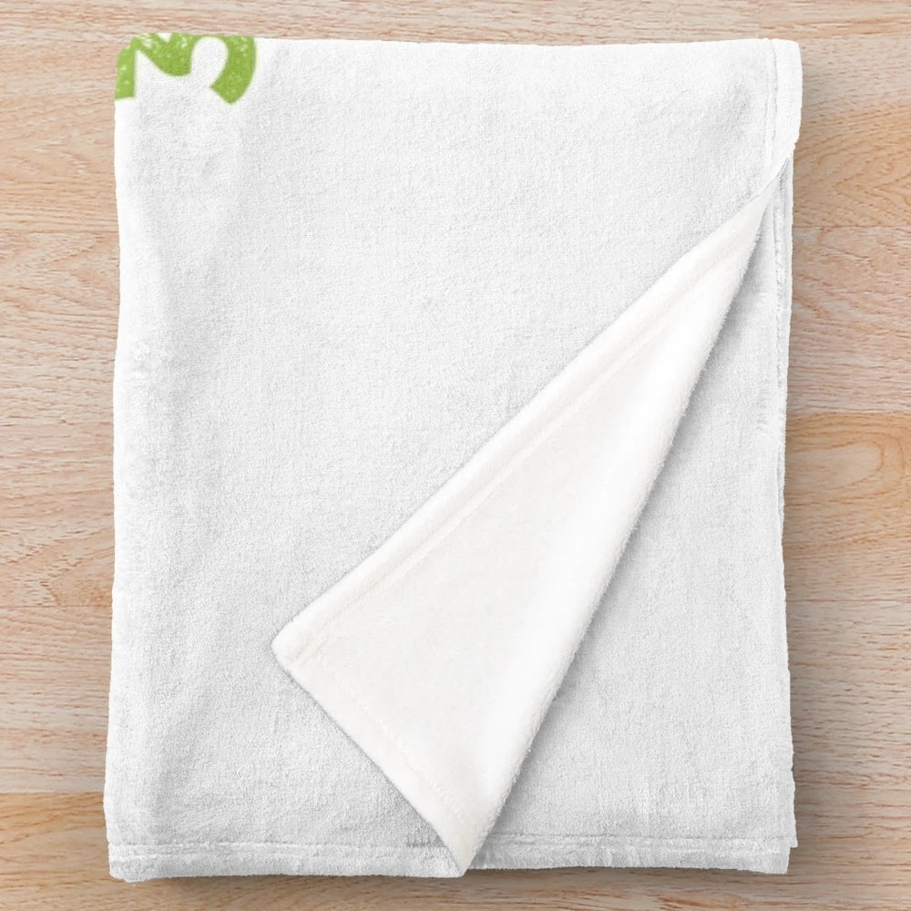 Plush blanket for weaving enthusiasts featuring a sassy and geeky weaving design