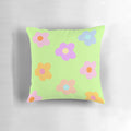 Pastel 5-petal floral aesthetic pillow with soft, green colors