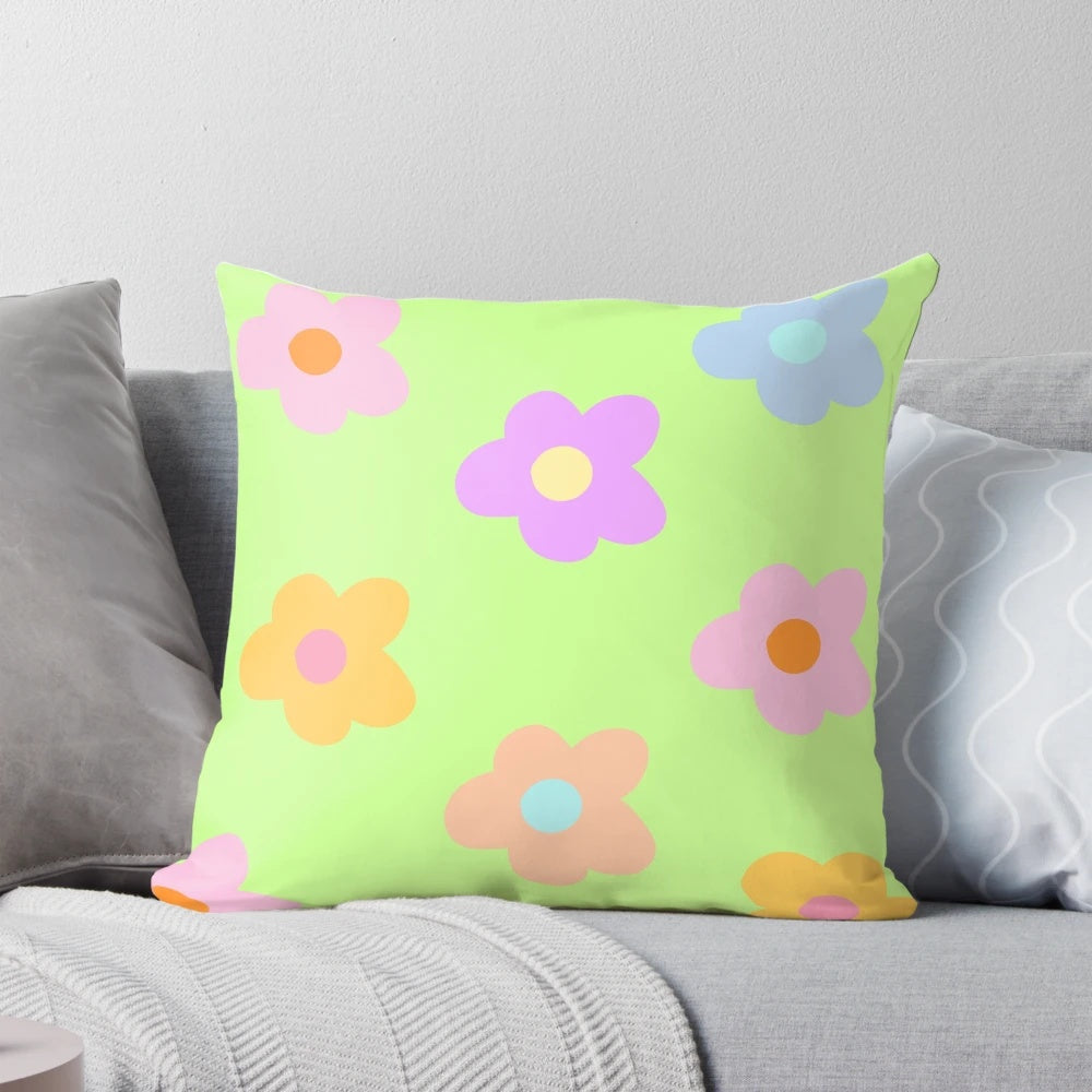 Pastel 5-petal floral aesthetic pillow with soft, green colors