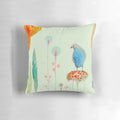 Pastel-colored bird and floral design on a soft, modern pillow for nursery or home decor.
