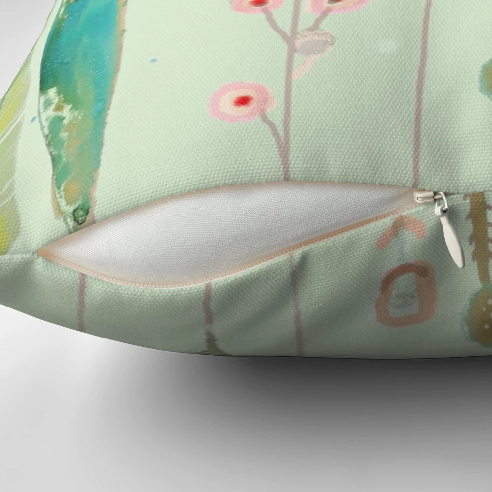Pastel-colored bird and floral design on a soft, modern pillow for nursery or home decor.