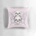A pastel-colored pillow featuring a striking image of a death moth or butterfly skull, creating a darkly elegant and eerie décor piece.
