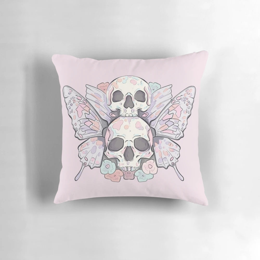 A pastel-colored pillow featuring a striking image of a death moth or butterfly skull, creating a darkly elegant and eerie décor piece.