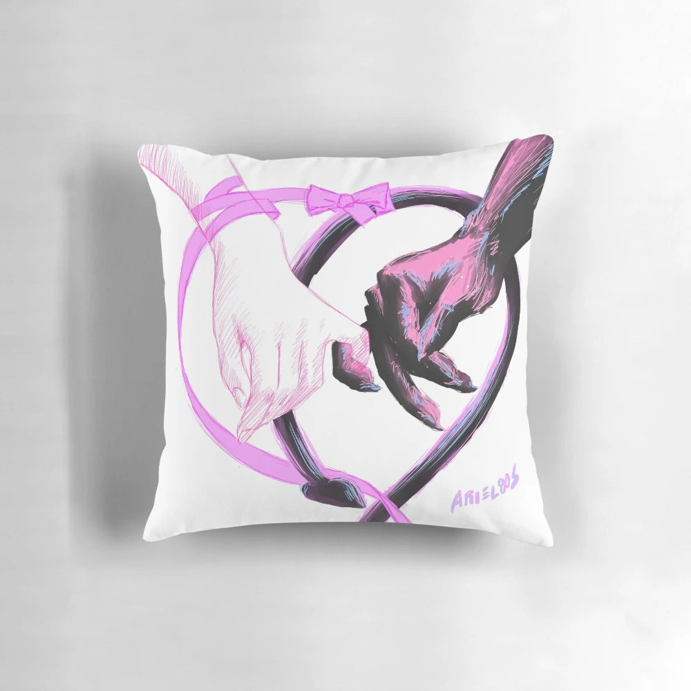 A soft, pastel-colored pillow with a detailed, hand-drawn demon illustration.