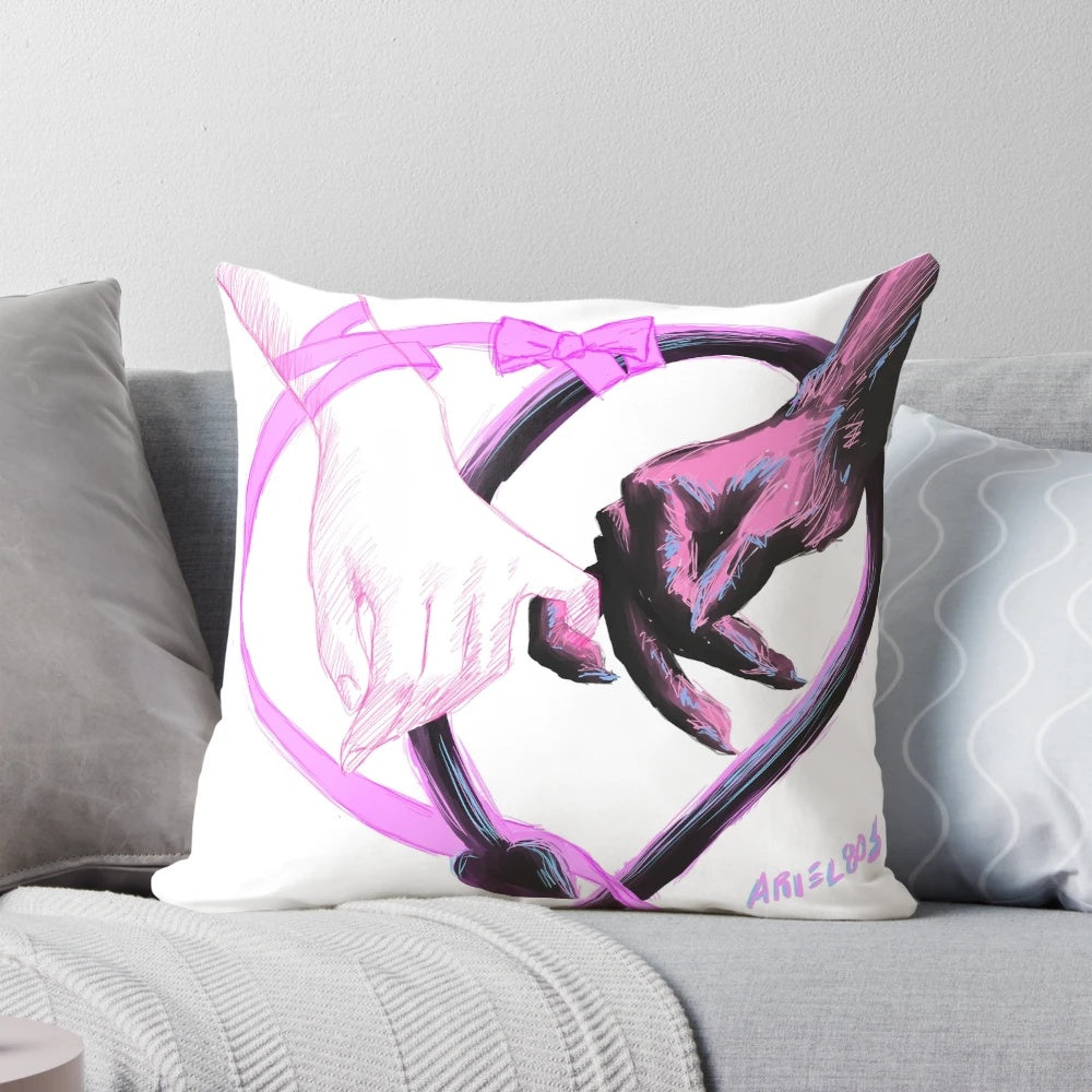 A soft, pastel-colored pillow with a detailed, hand-drawn demon illustration.