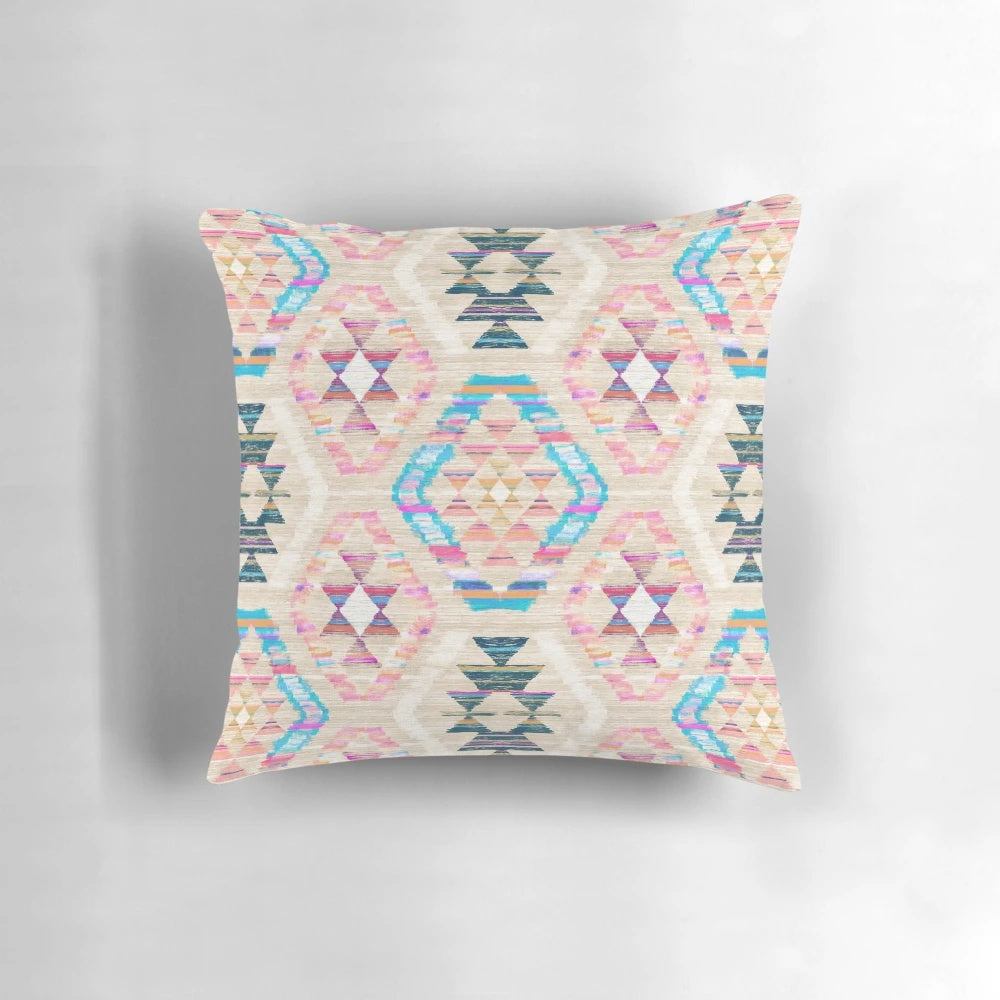 A pastel-colored woven kilim patterned throw pillow with a textured surface.