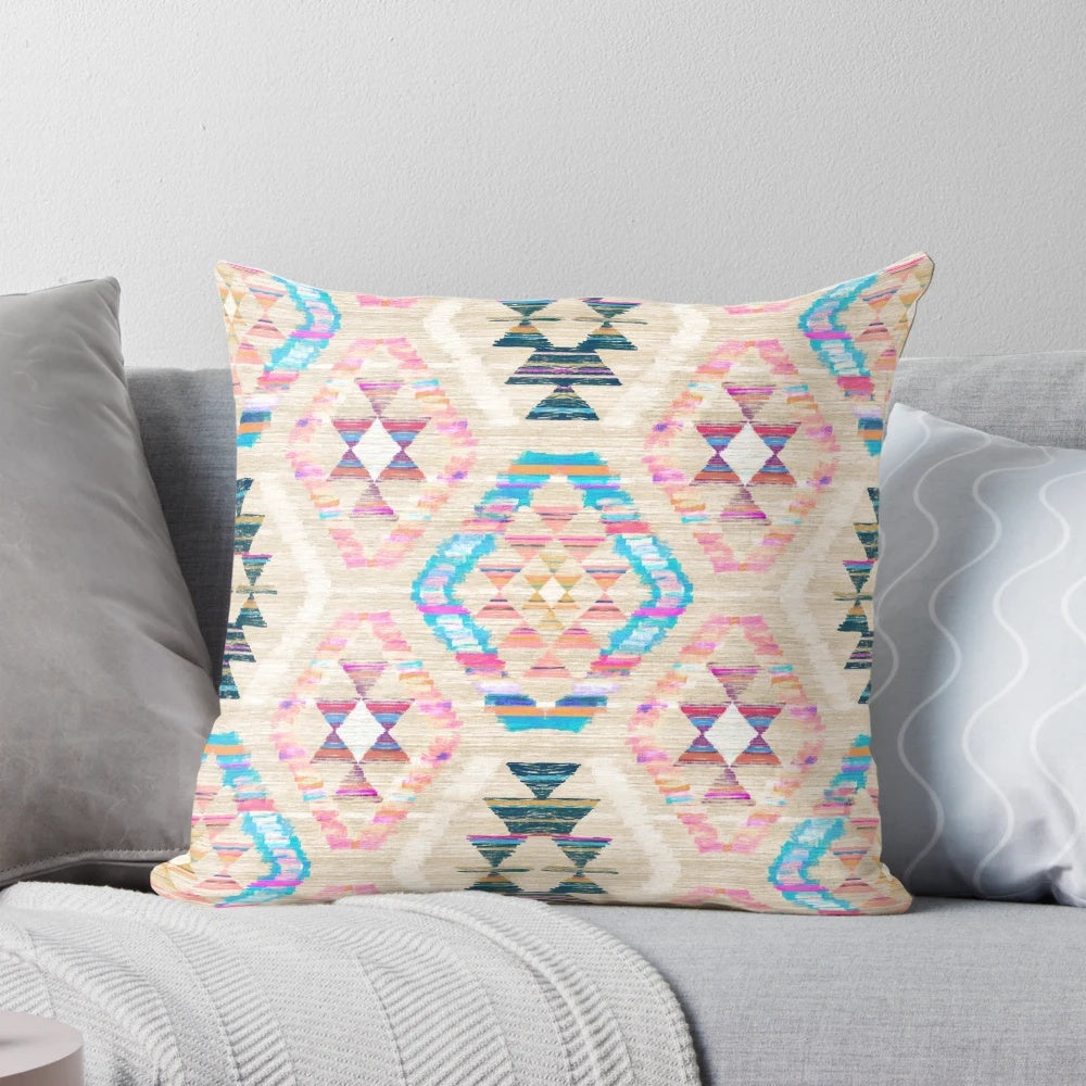 A pastel-colored woven kilim patterned throw pillow with a textured surface.
