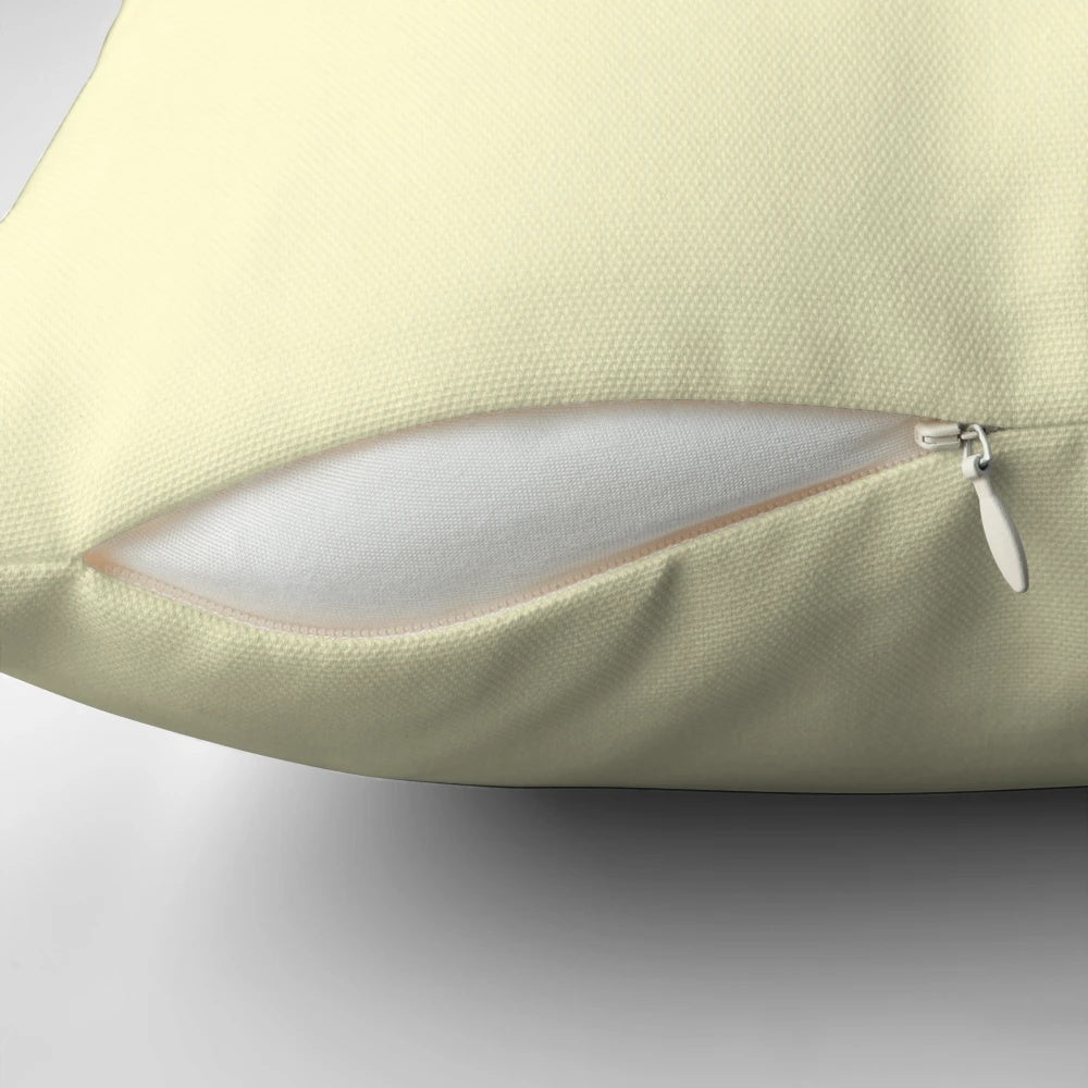 Pastel lemon yellow soft pillow with a solid color design