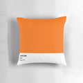 Pastel orange throw pillow with modern, minimalist design