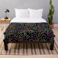 Pastel pattern plush blanket with a funny, risque penis design