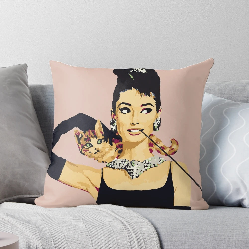 Pastel pink pillow with Audrey Hepburn-inspired design