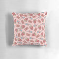 Pastel pink throw pillow with a stylized movie pattern design, featuring popcorn, movie glasses, and a retro 80s aesthetic.