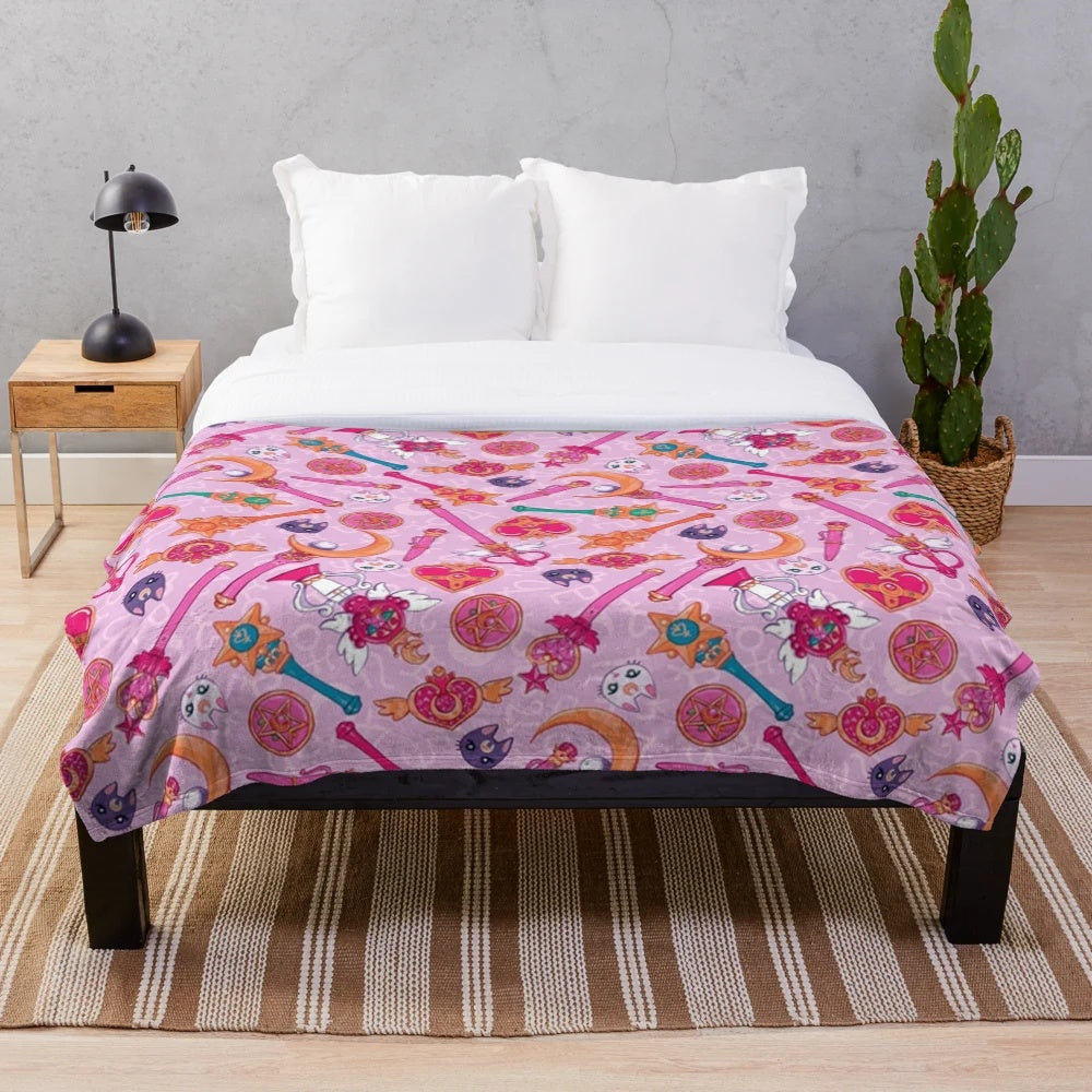 Pastel pink and purple plush blanket with moon and anime inspired design