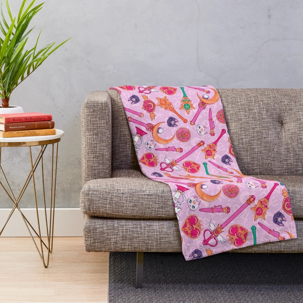 Pastel pink and purple plush blanket with moon and anime inspired design
