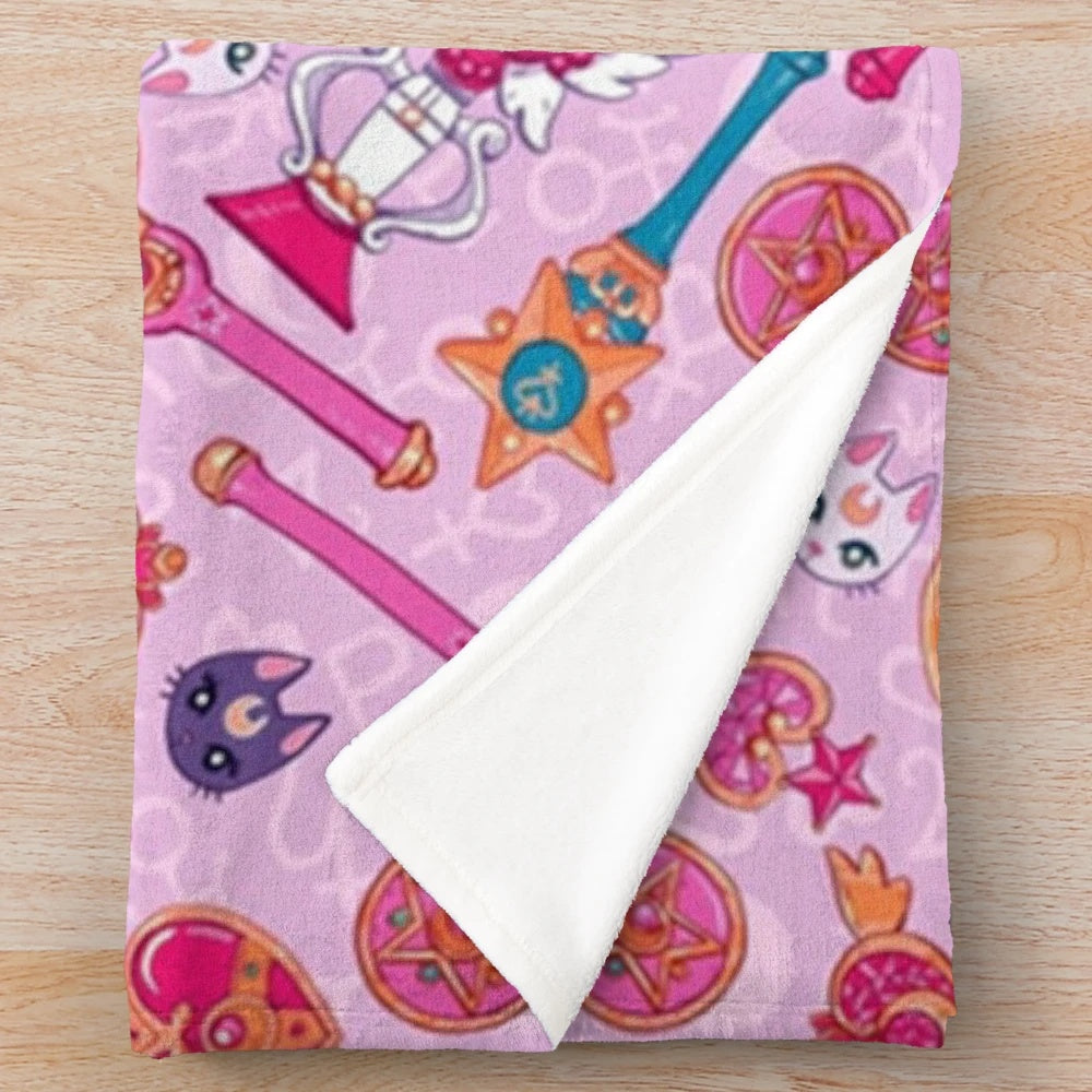Pastel pink and purple plush blanket with moon and anime inspired design