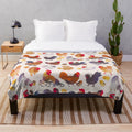 Pastel plush blanket featuring a delightful chicken and chick design, perfect for farmhouse decor