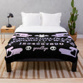 Pastel plush blanket with occult, witchy, and spooky design
