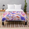 Pastel plush blanket featuring a ray art design