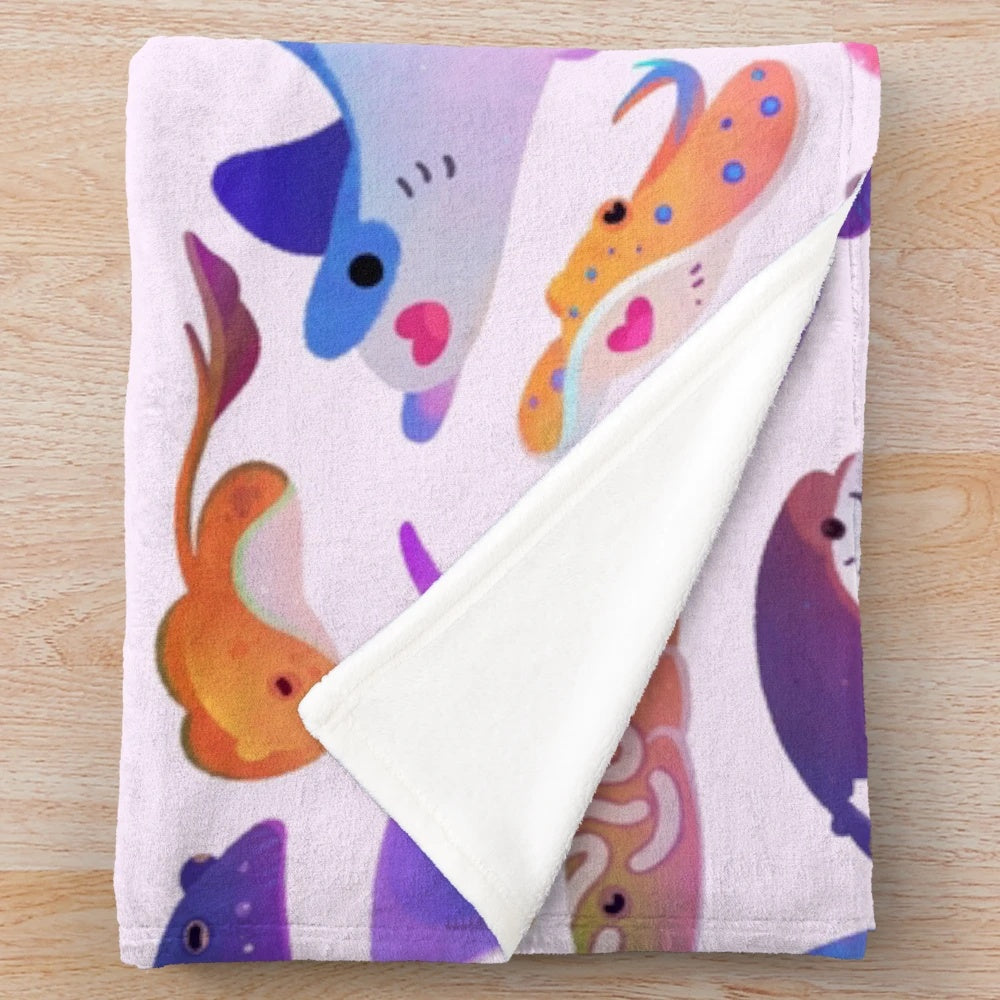 Pastel plush blanket featuring a ray art design