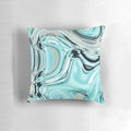 Decorative pillow with an abstract marble swirl pattern in soothing pastel shades of turquoise, aqua, and blue.