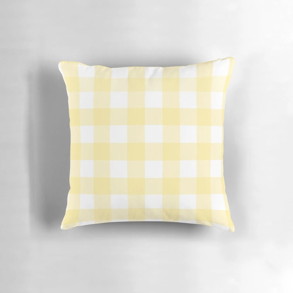 Pastel yellow gingham patterned decorative pillow