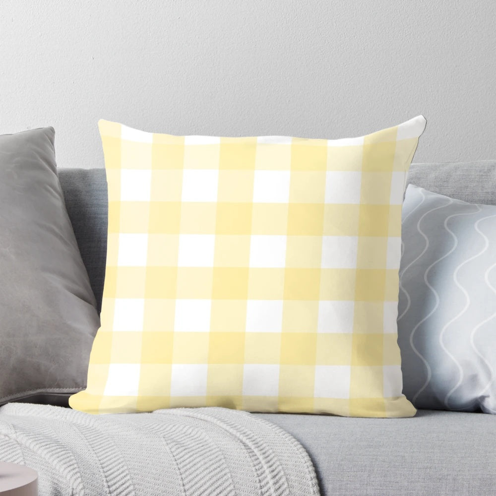 Pastel yellow gingham patterned decorative pillow