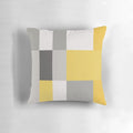 Patchwork pillow in a trendy mustard and grey color scheme