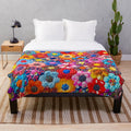 Patchwork plush blanket in colorful pattern