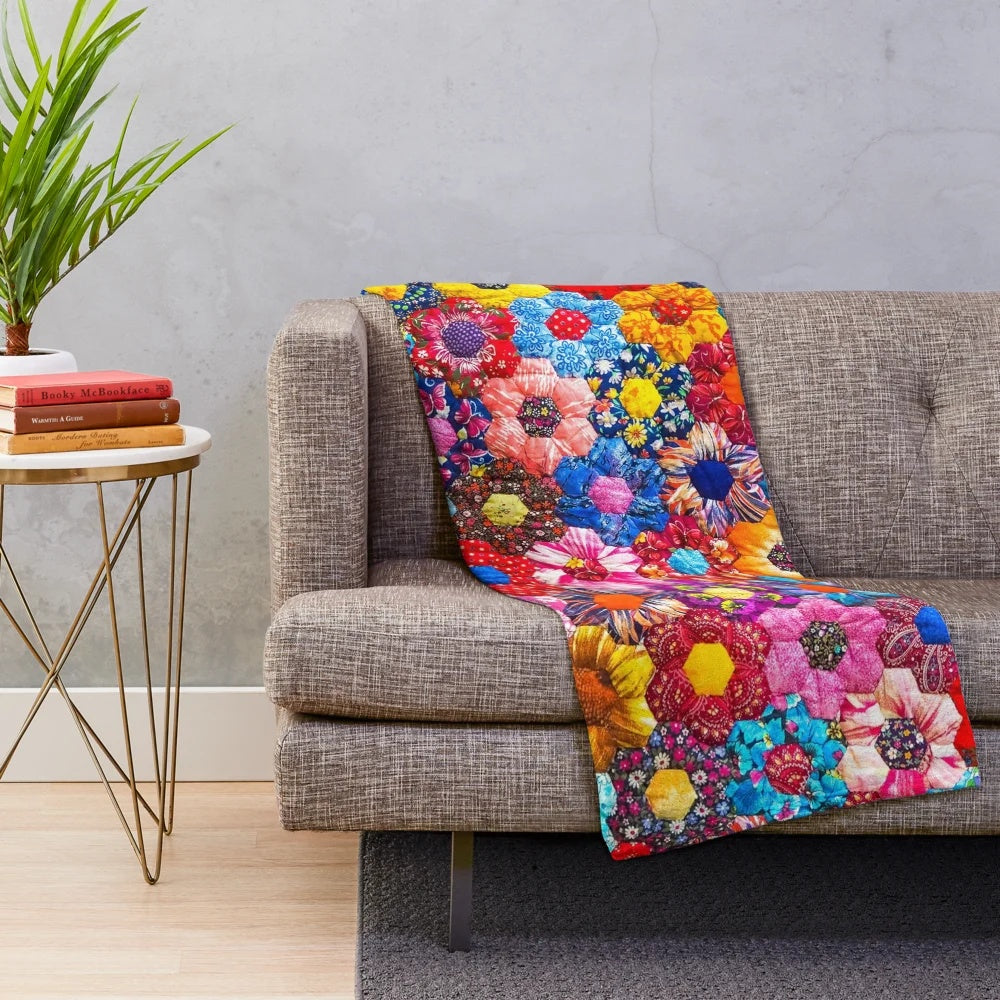 Patchwork plush blanket in colorful pattern
