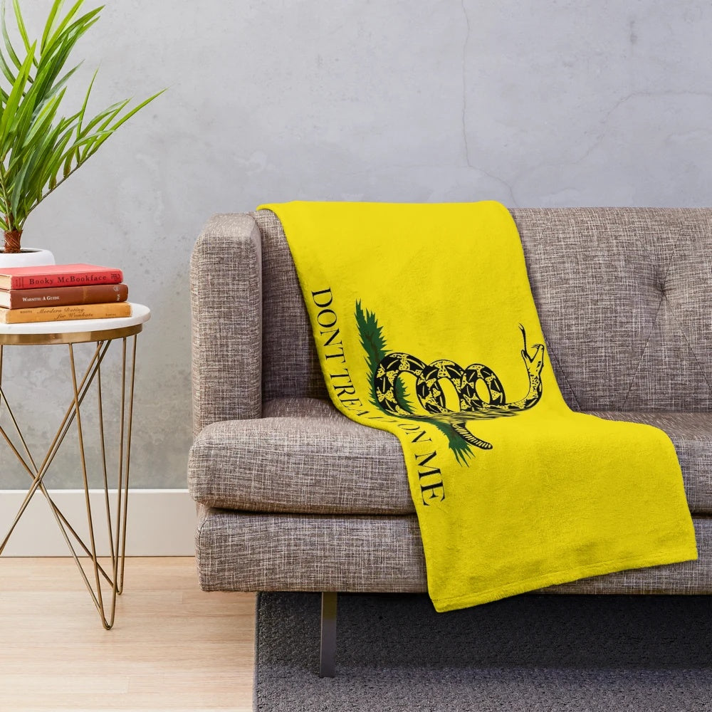 Soft and cozy plush blanket featuring the historic Gadsden Don't Tread On Me flag design