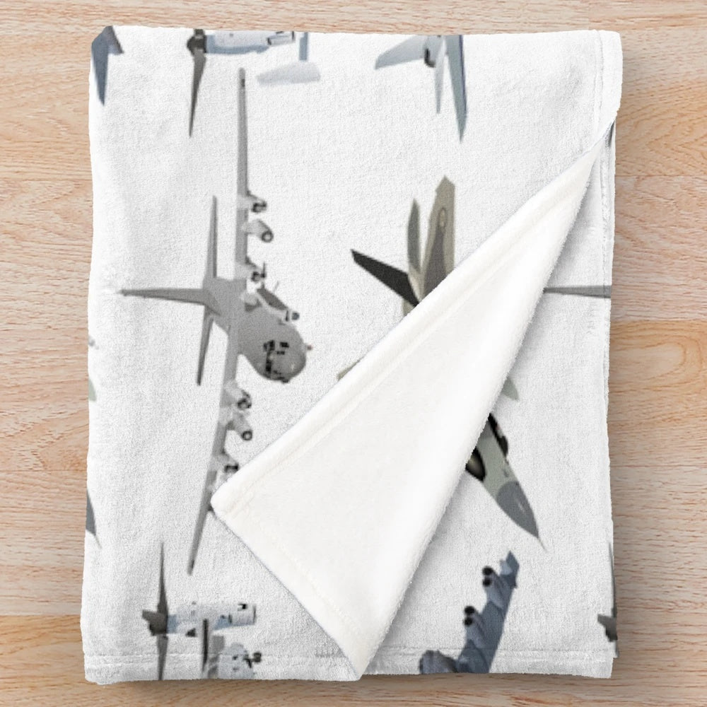 Plush blanket with a variety of military aircraft and patriotic designs