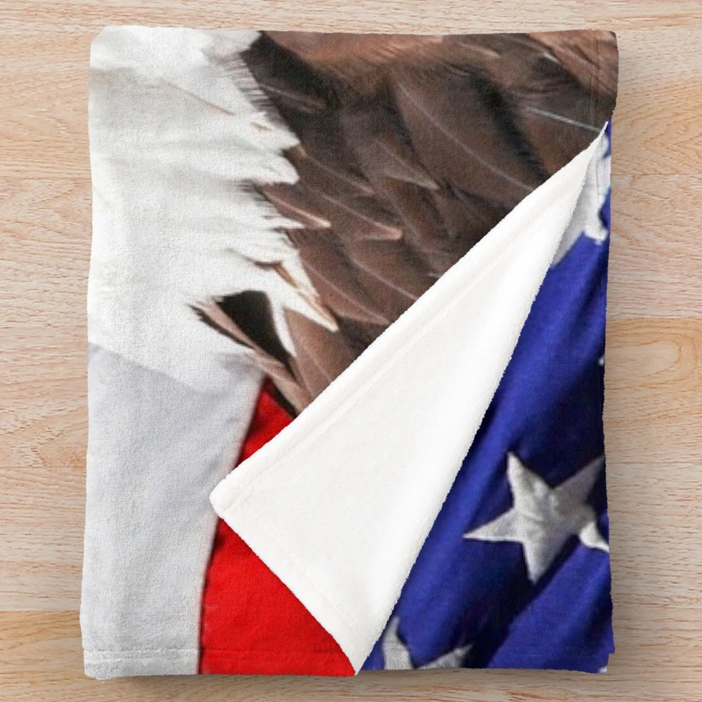 Plush blanket with an image of the American bald eagle and American flag