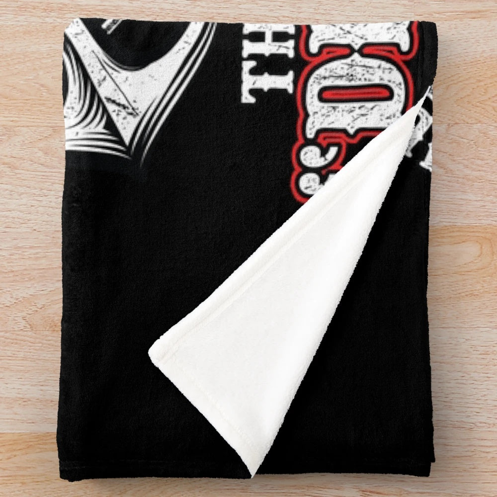 Plush blanket featuring the USMC Devil Dogs symbol
