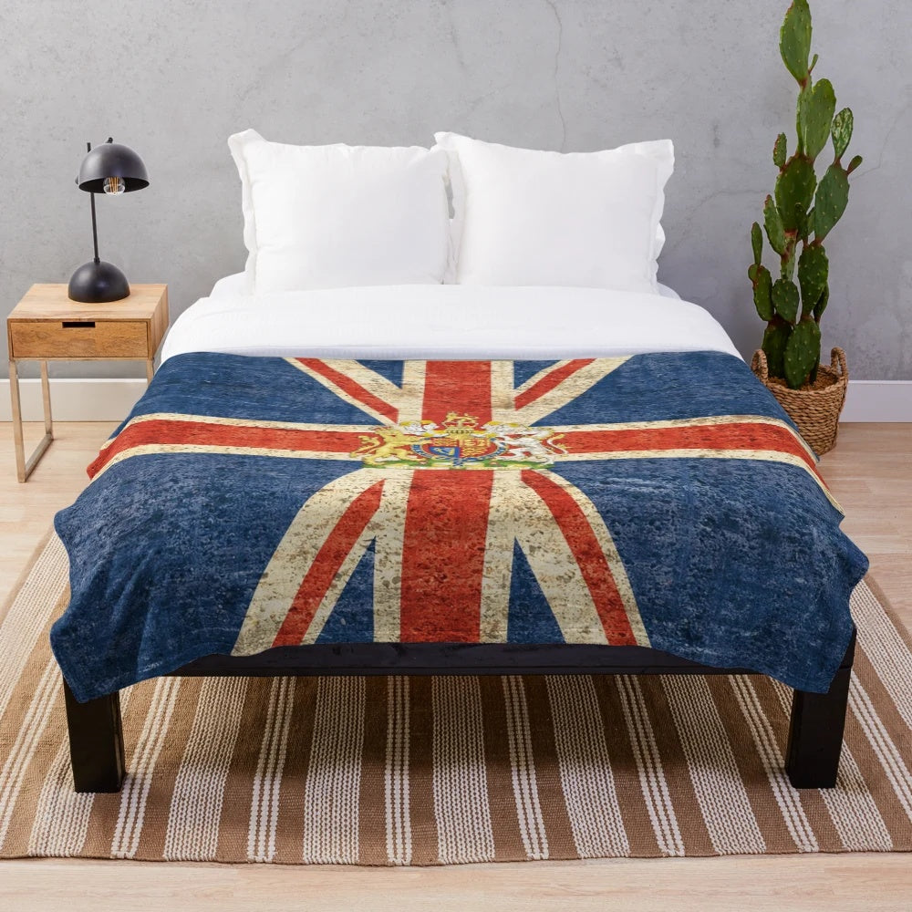 Plush blanket featuring the flag of the United Kingdom and the royal coat of arms