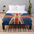 Plush blanket featuring the flag of the United Kingdom and the royal coat of arms