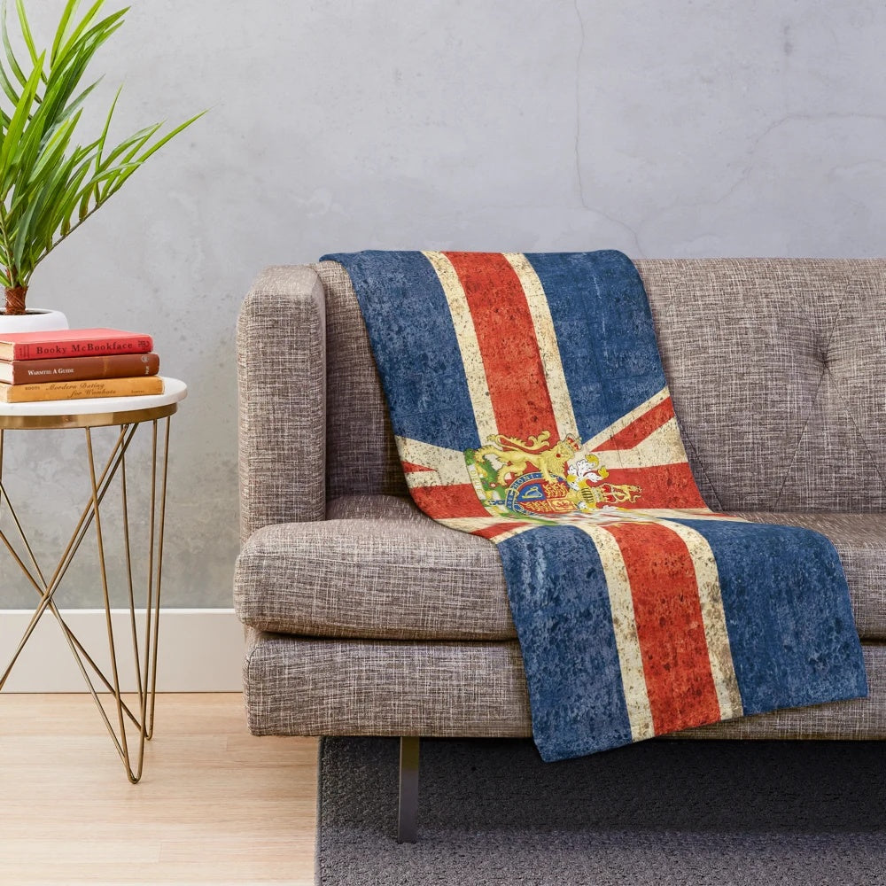 Plush blanket featuring the flag of the United Kingdom and the royal coat of arms
