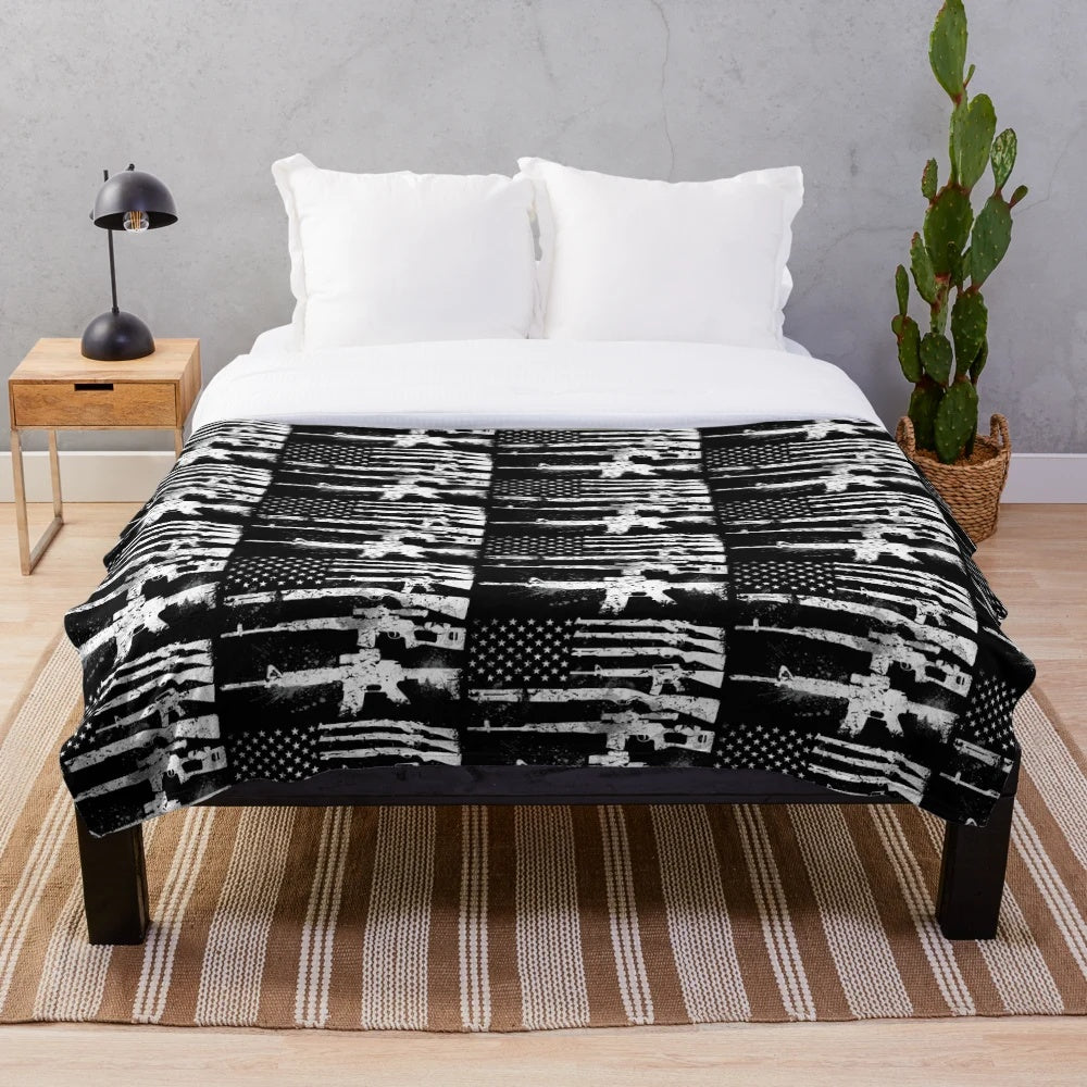 Plush blanket featuring a design with the USA American flag and guns