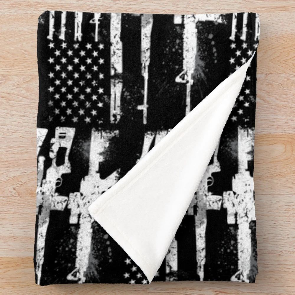 Plush blanket featuring a design with the USA American flag and guns