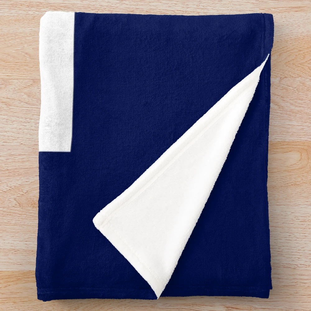 Royal Navy inspired plush blanket with navy insignia and coat of arms