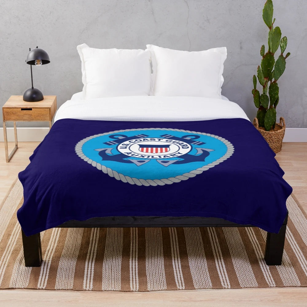 Cozy and patriotic plush blanket featuring the United States Coast Guard Auxiliary logo