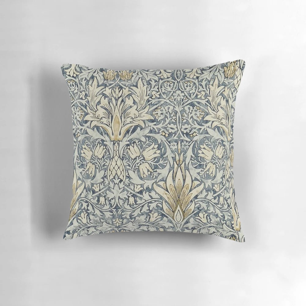 Decorative pillow featuring the iconic William Morris snakeshead pattern in a botanical floral design