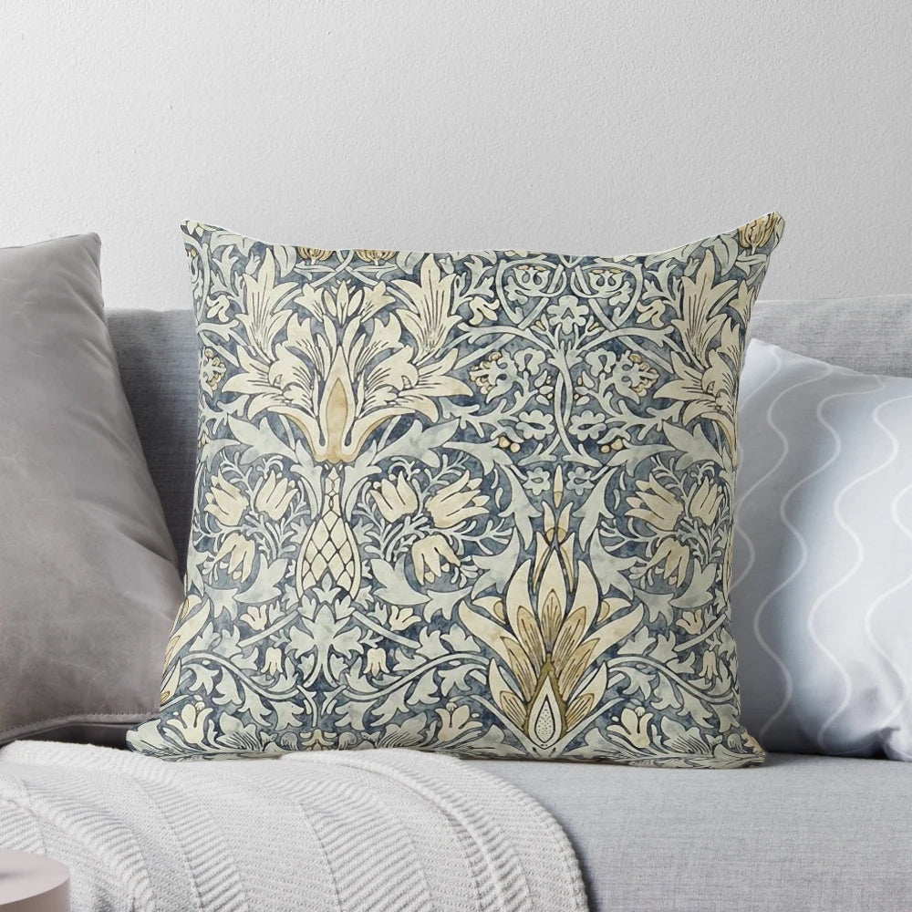 Decorative pillow featuring the iconic William Morris snakeshead pattern in a botanical floral design