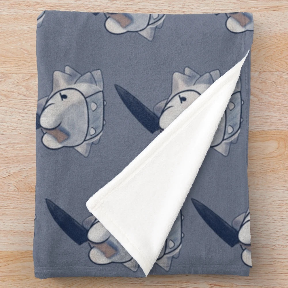 Patterned plush blanket with an angry snom holding a knife
