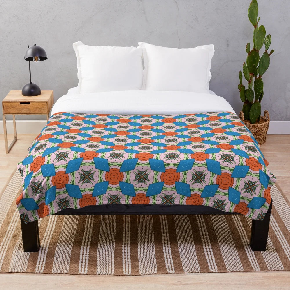 Patterned plush blanket with various designs for a cozy and comfortable living space