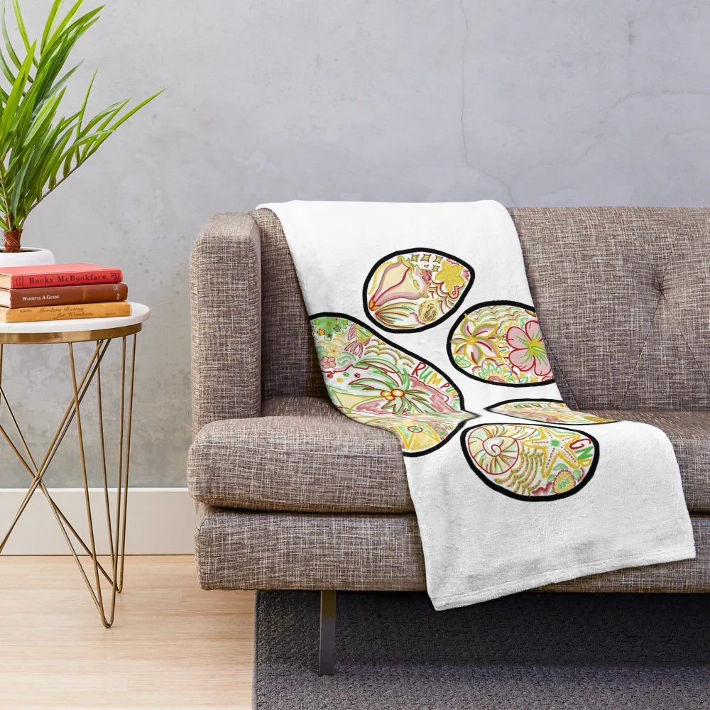 Pawprint inspired plush blanket with Grenada design