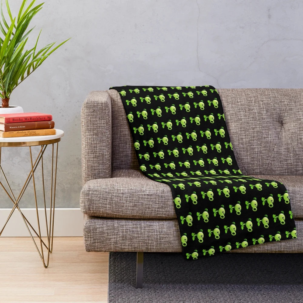 Pea plant plush blanket featuring a black background